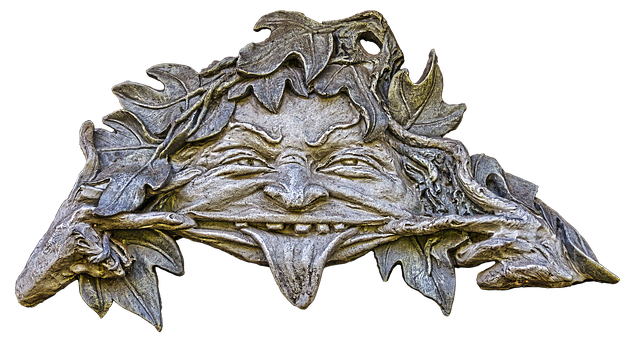 Green Man Leaf Mask Sculpture PNG image