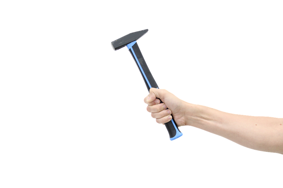 Hand Holding Hammer PNG image