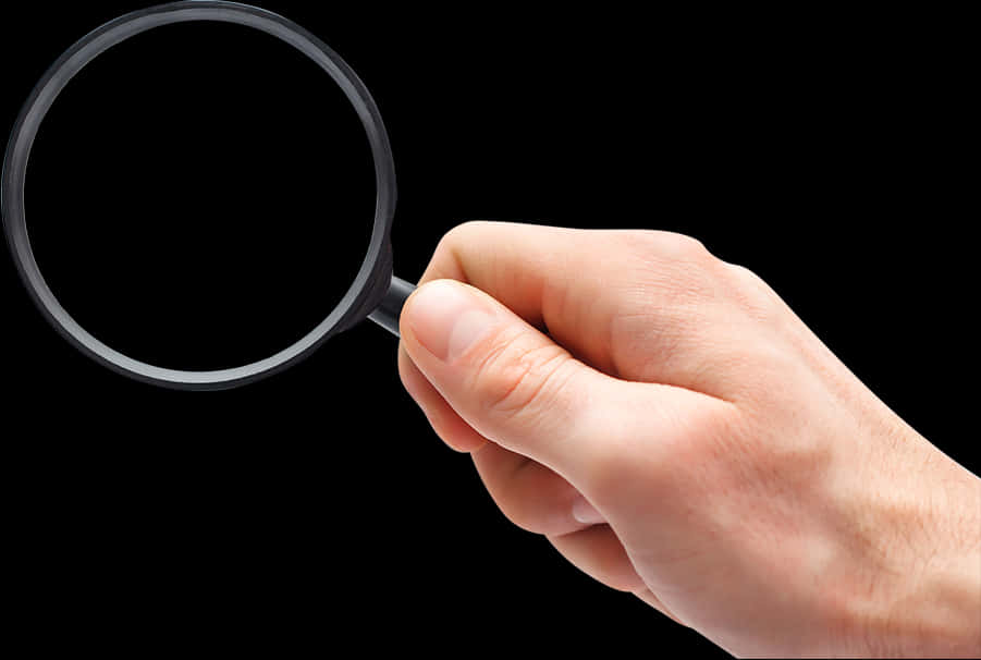 Hand Holding Magnifying Glass PNG image