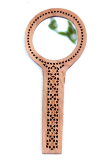 Handheld Wooden Mirrorwith Intricate Carvings PNG image