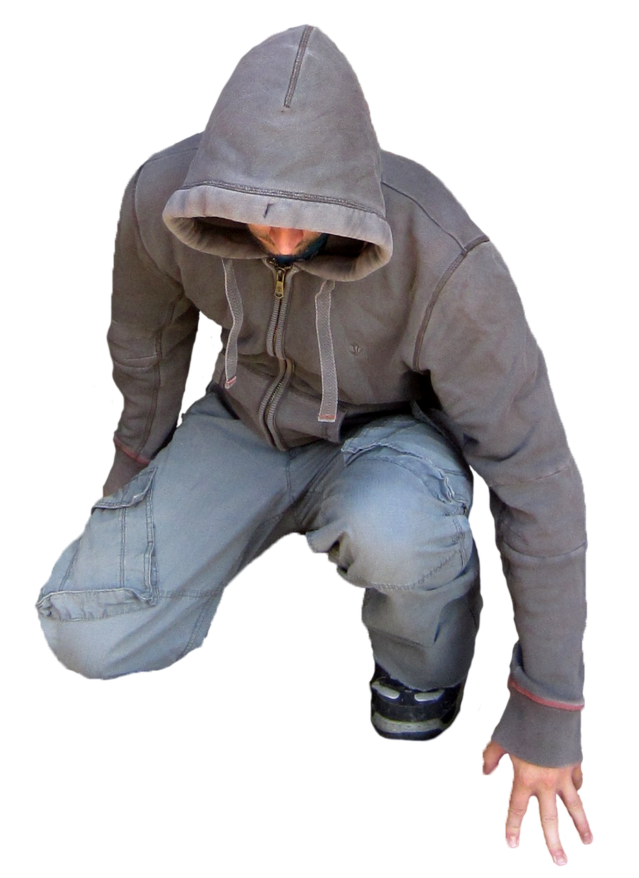 Hooded Man Crouching Pose PNG image