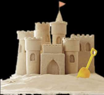 Intricate Sand Castlewith Shovel PNG image