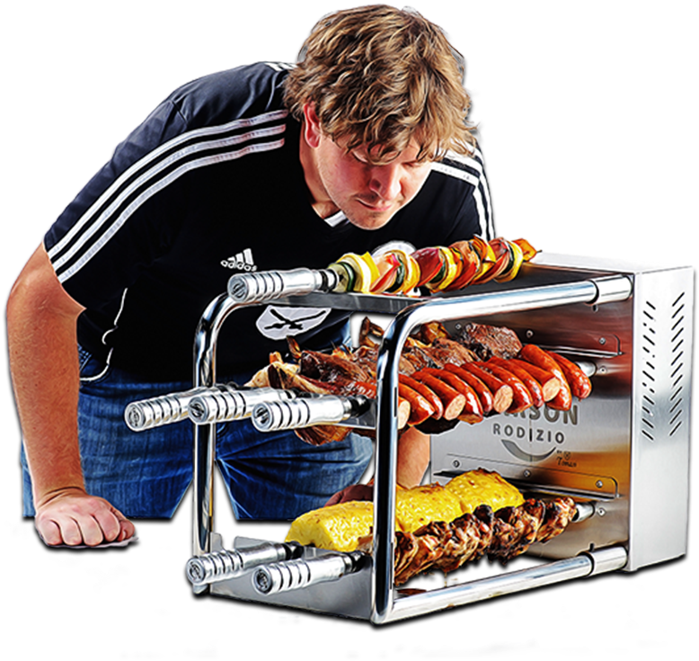 Man Inspecting Tabletop Rodizio Grill PNG image