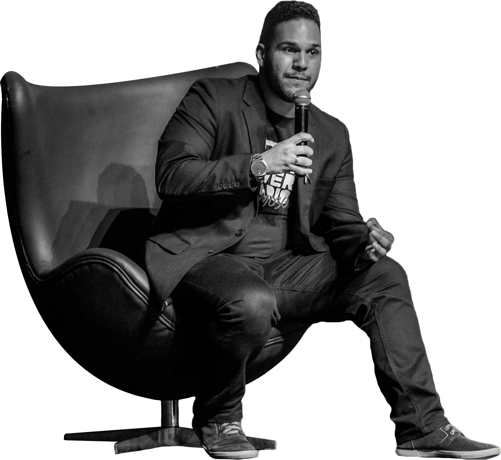 Man Sittingin Chair Speaking PNG image