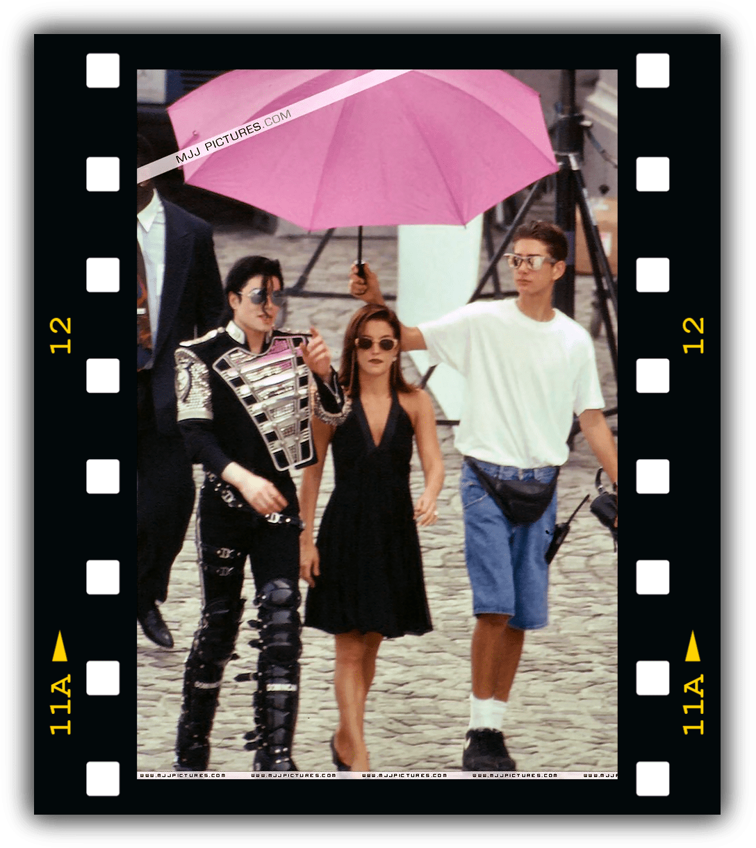 Michael Jackson Candid Walkwith Friends PNG image
