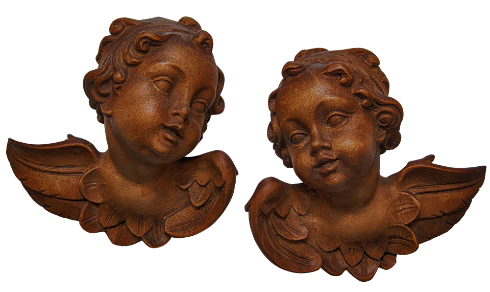 Pairof Wooden Angel Sculptures PNG image