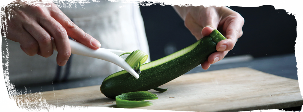 Peeling Zucchinion Cutting Board PNG image