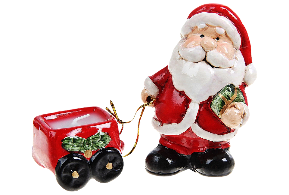 Santa Claus Figurinewith Toy Wagon PNG image