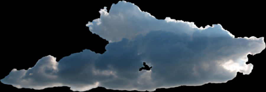 Silhouetted Bird Flying Across Cloudy Sky PNG image