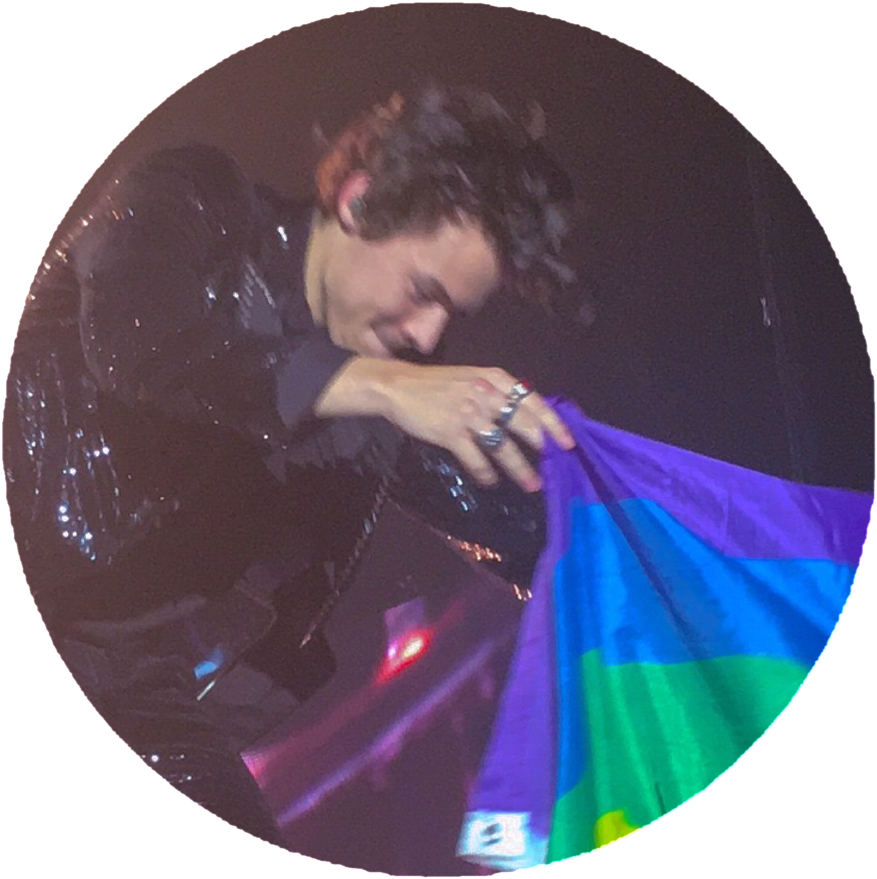 Singer Holding Pride Flag Concert Moment PNG image