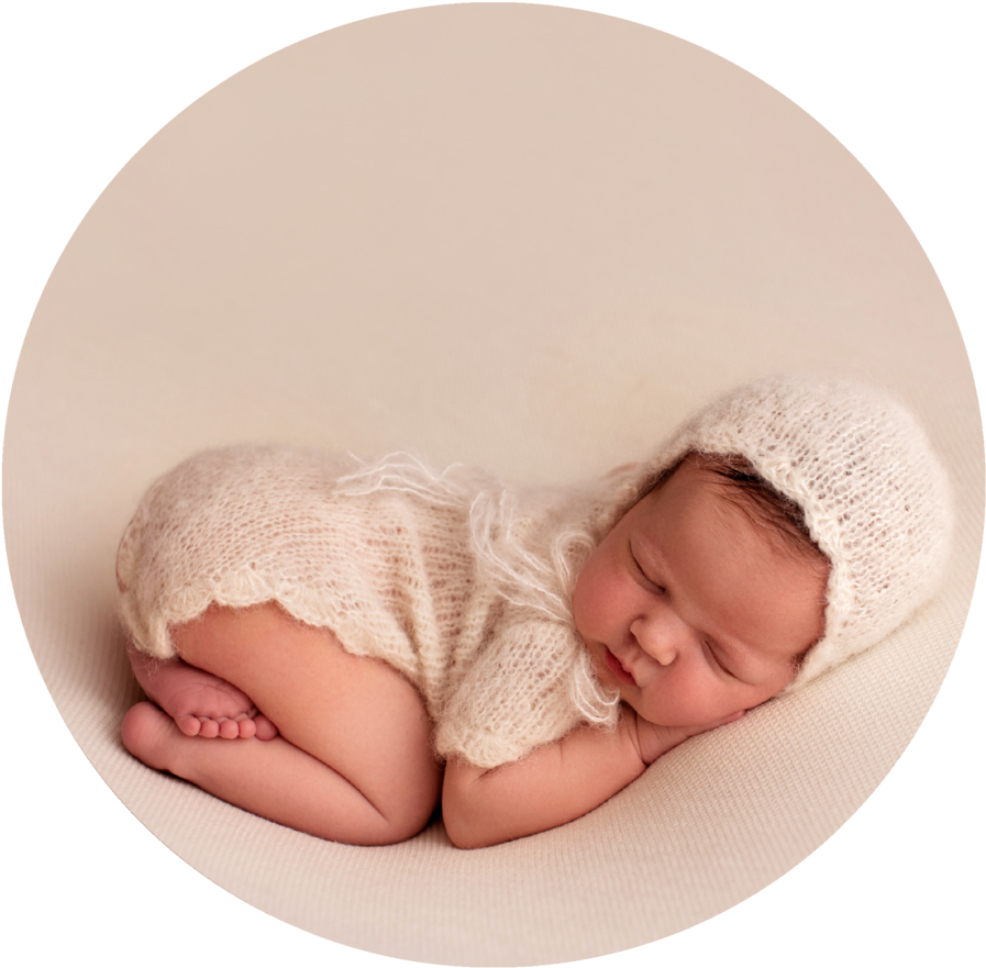 Sleeping Newborn Babyin Knitwear PNG image
