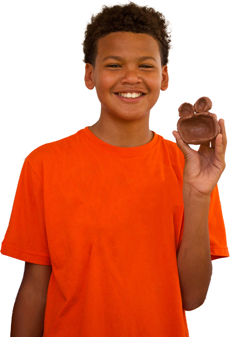 Smiling Boy Holding Chocolate Bunny PNG image