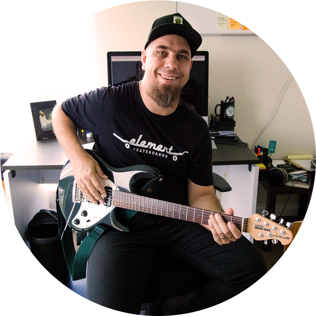 Smiling Guitarist Office Setting PNG image