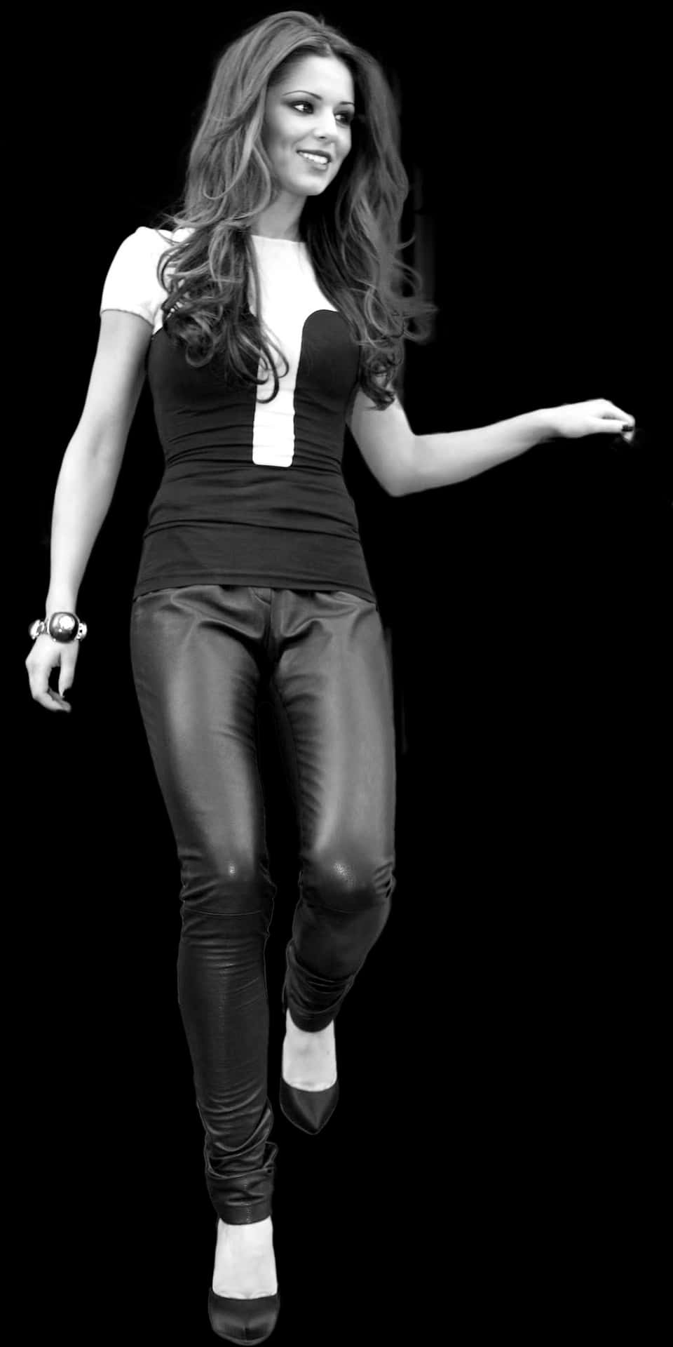 Smiling Womanin Blackand White Outfit PNG image