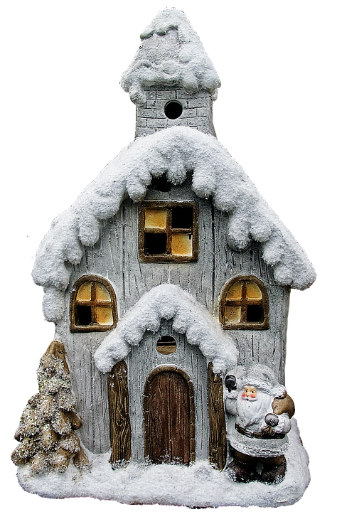 Snowy Christmas Housewith Santa Figurine PNG image