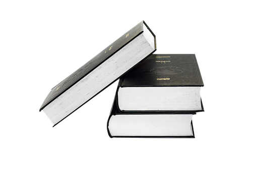 Stacked Bookson Black Background PNG image