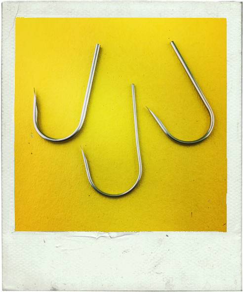 Three Fish Hooks Yellow Background PNG image