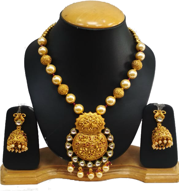 Traditional Golden Jewelry Set Display PNG image