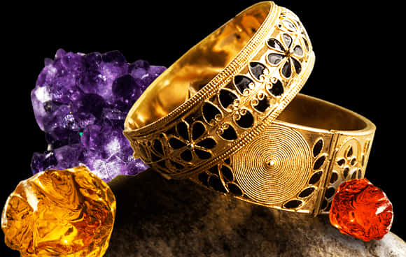 Traditional Indian Gold Bangles Display PNG image