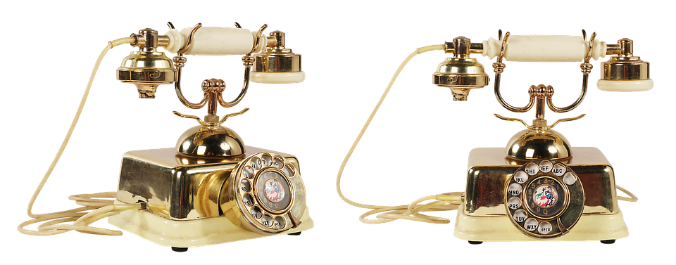 Vintage Gold Rotary Telephones PNG image