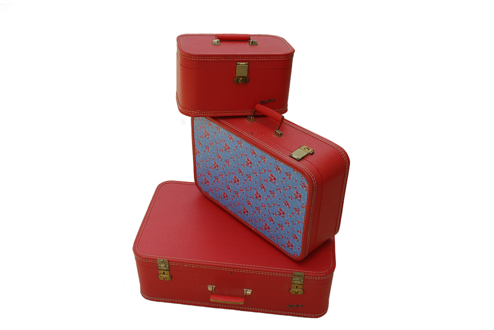 Vintage Red Suitcases Stacked PNG image