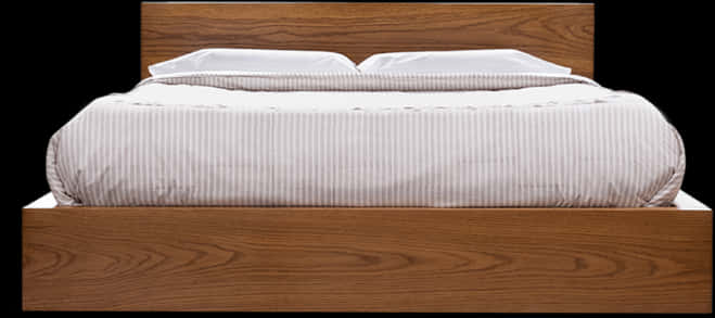 Wooden Frame Bedwith White Bedding PNG image