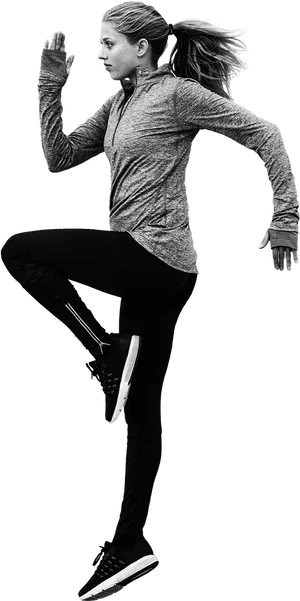Active Female Runner In Motion
