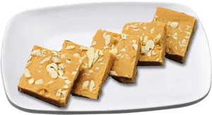Almond Topped Barfi Sweets PNG image