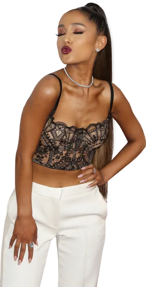 Ariana Grande Posingin Lace Topand White Pants PNG image