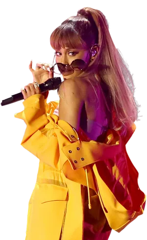 Ariana Grande Yellow Jacket Performance PNG image