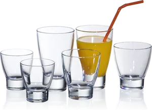 Assorted Glasses With Orange Juice PNG image