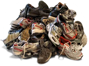 Assorted Sports Shoes Pile PNG image