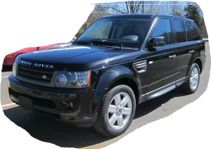 Black Land Rover S U V Parked Outdoors PNG