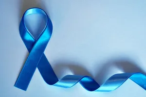 Blue Awareness Ribbonon White Background PNG image