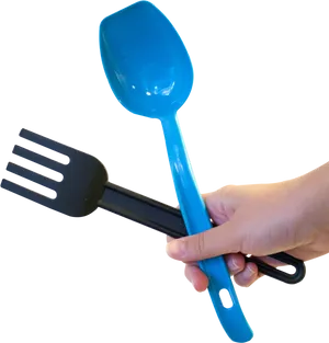 Blue Spoonand Black Forkin Hand PNG image