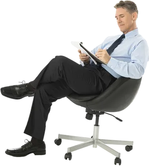 Businessman Relaxingin Office Chairwith Tablet PNG image