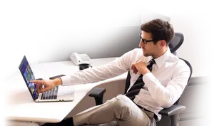 Businessman Using Laptop Office Setting PNG image