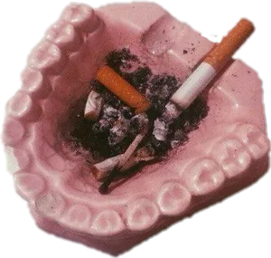Cigarette Buttsin Ashtray PNG image