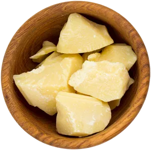 Cocoa Butter Chunksin Wooden Bowl PNG image