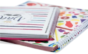 Colorful Spiral Notebooks Stacked PNG image