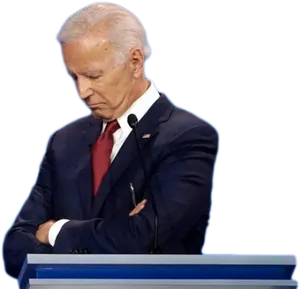 Contemplative Political Figureat Podium PNG