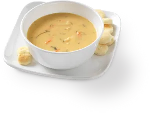 Creamy Soupwith Croutonson Plate PNG image