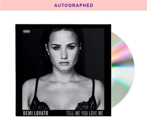 Demi Lovato Tell Me You Love Me Autographed Album PNG image