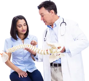 Doctor Explaining Spine Modelto Patient PNG