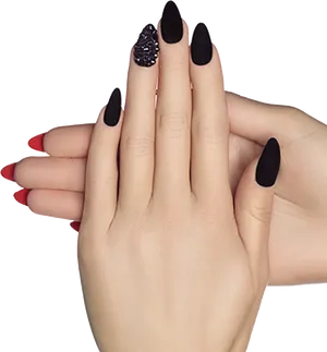 Elegant Black Stiletto Nailswith Accent PNG image