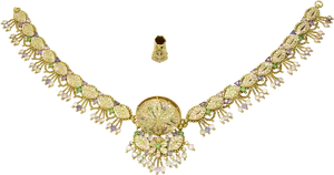 Elegant Gold Necklace Setwith Pearlsand Gems PNG image