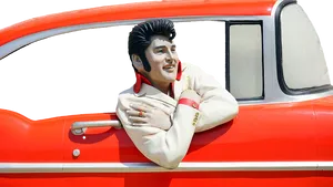 Elvis Presley Figurein Classic Car PNG image