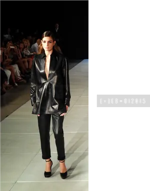 Fashion Runway Modelin Black Leather Outfit PNG image