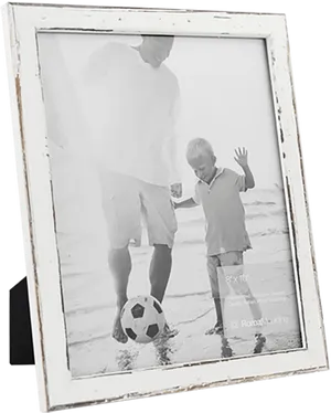 Father Son Soccer Beach Moment PNG image