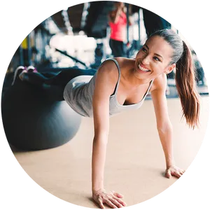 Fitness Enthusiast Performing Plankon Gym Ball PNG